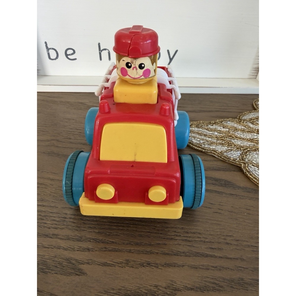 Vintage Push N Go Fire Truck Toy 1975 TOMY Taiwan Pop Up Driver Vehicle